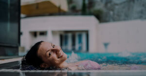 lady-enjoying-her-hot-tub-sand-diego-maintenance-blog-page